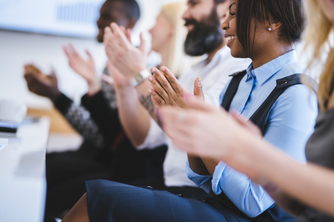 Clapping meeting people