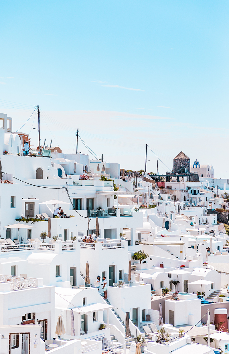 Vista of a hillside of white houses n Greece