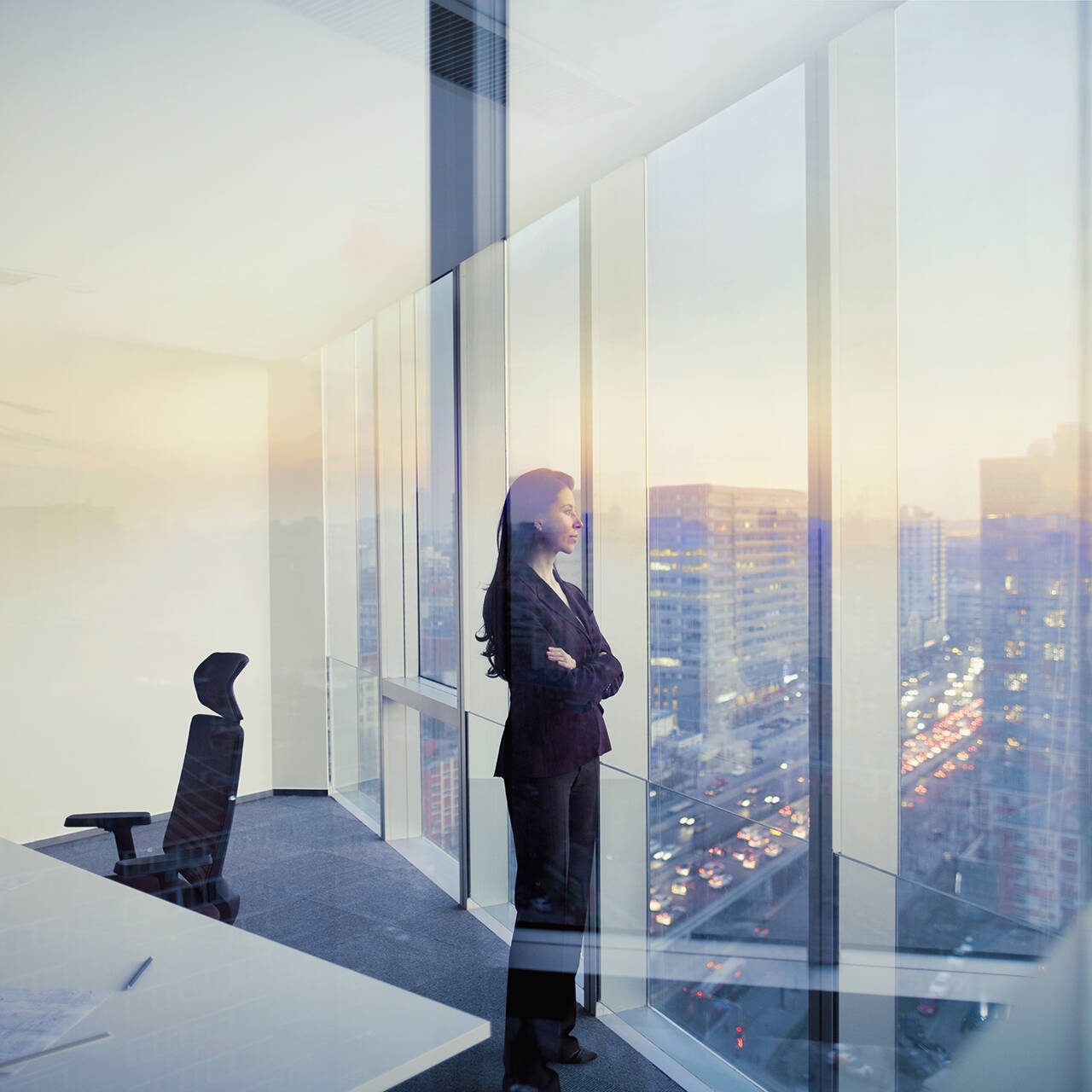 Adult Hispanic woman CEO executive  businesswoman business person in conference meeting room in contemporary modern office daylight sunset dusk talking planning thinking strategy well dressed suit diversity multi-ethnic problems solutions unity cityscape downtown urban new beginnings breaking new ground decisions choices the way forward  contemplation vision focus choices decisions solitude quiet alone